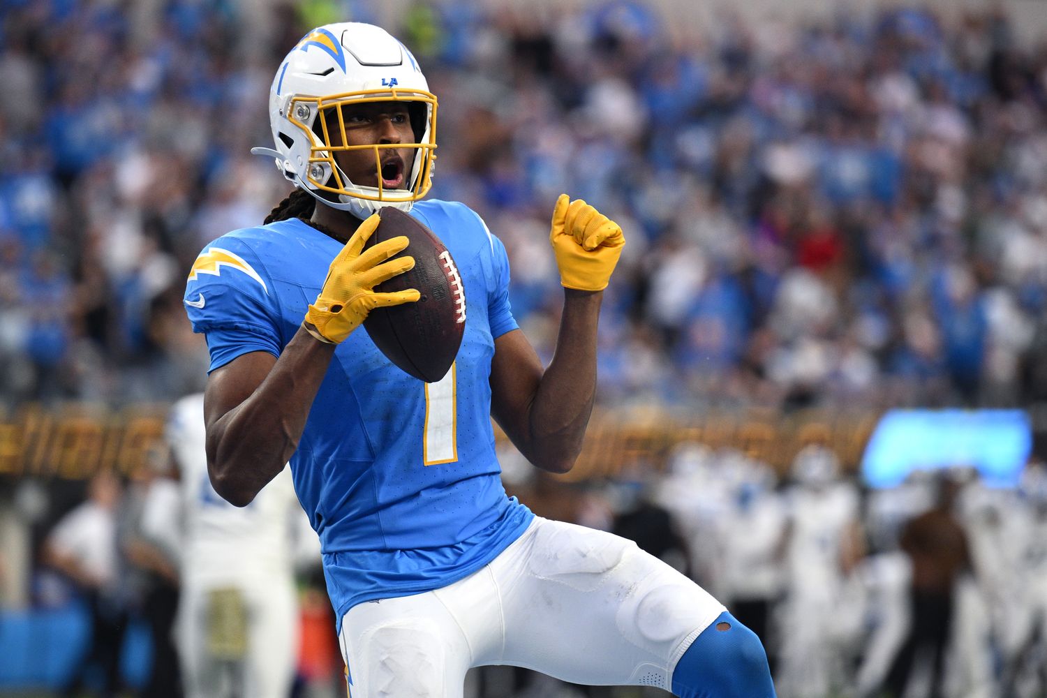 Nov 12, 2023; Inglewood, California, USA; Los Angeles Chargers wide receiver Quentin Johnston (1) celebrates after scoring a touchdown against the Detroit Lions during the second half at SoFi Stadium. Mandatory Credit: Orlando Ramirez-USA TODAY Sports  